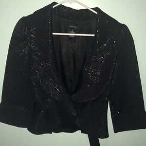This is a black blazer of high quality.